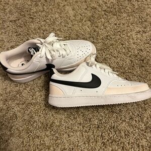 Nike Kids White Sneakers with Black Swoosh